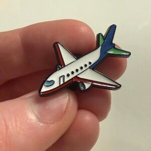 Colorful Airplane Enamel Pin-White & Black with Accents of Red, Blues,& Green